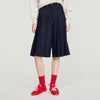 Short largo plisado de lana