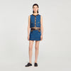Top de denim y cuero
