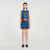 Top de denim y cuero