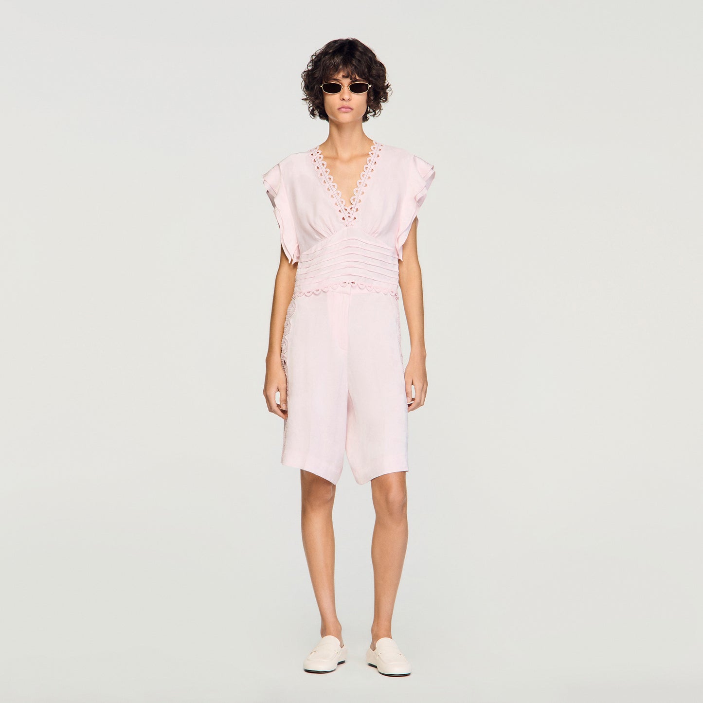 Top corto con jacquard de flores