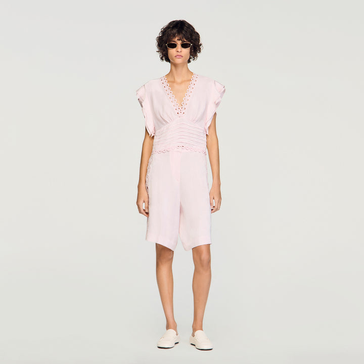 Top corto con jacquard de flores
