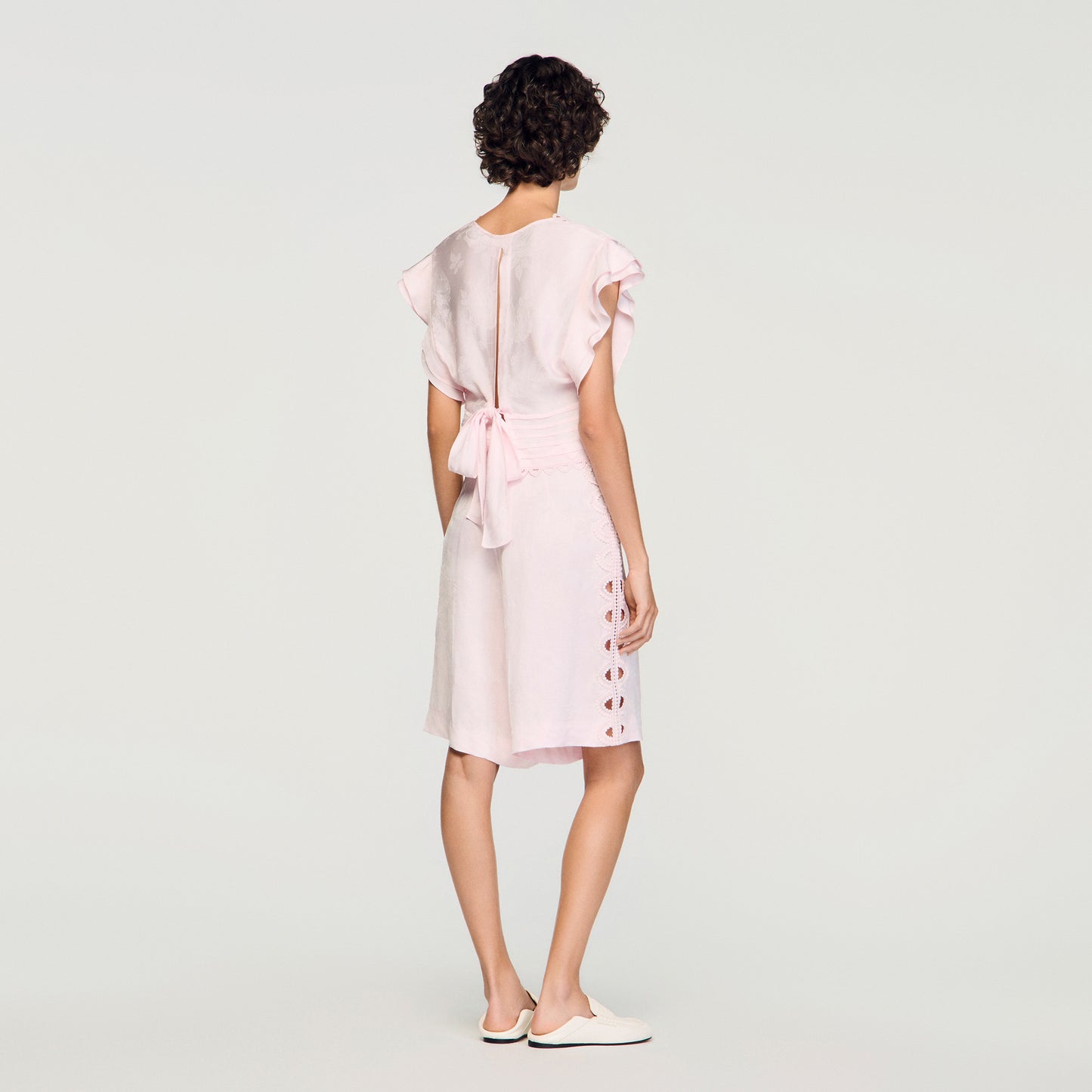 Top corto con jacquard de flores
