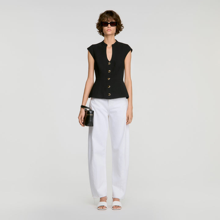 Top peplum abotonado