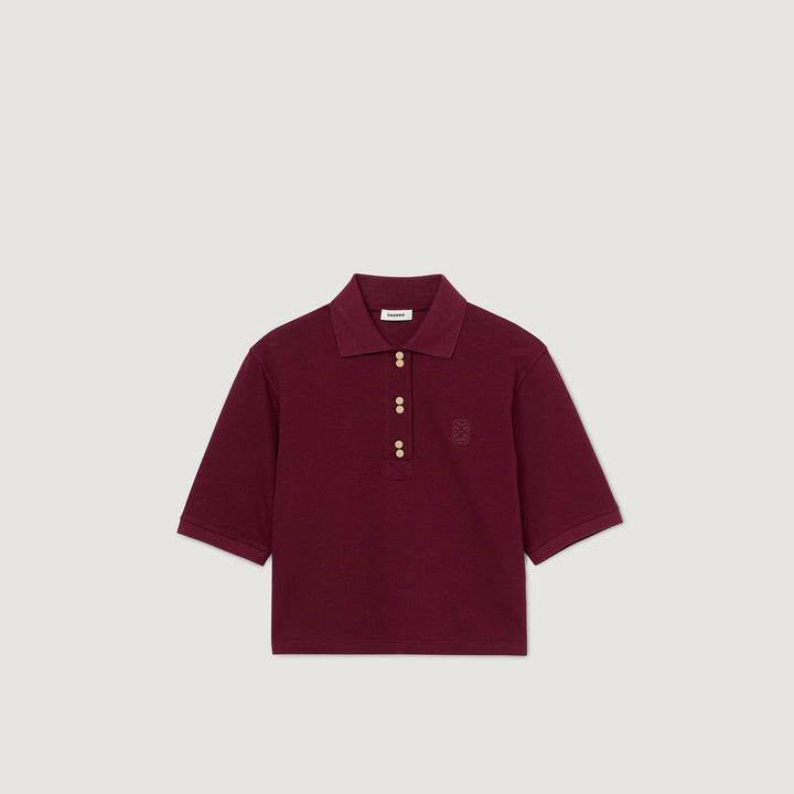 Polo con botones de fantasía