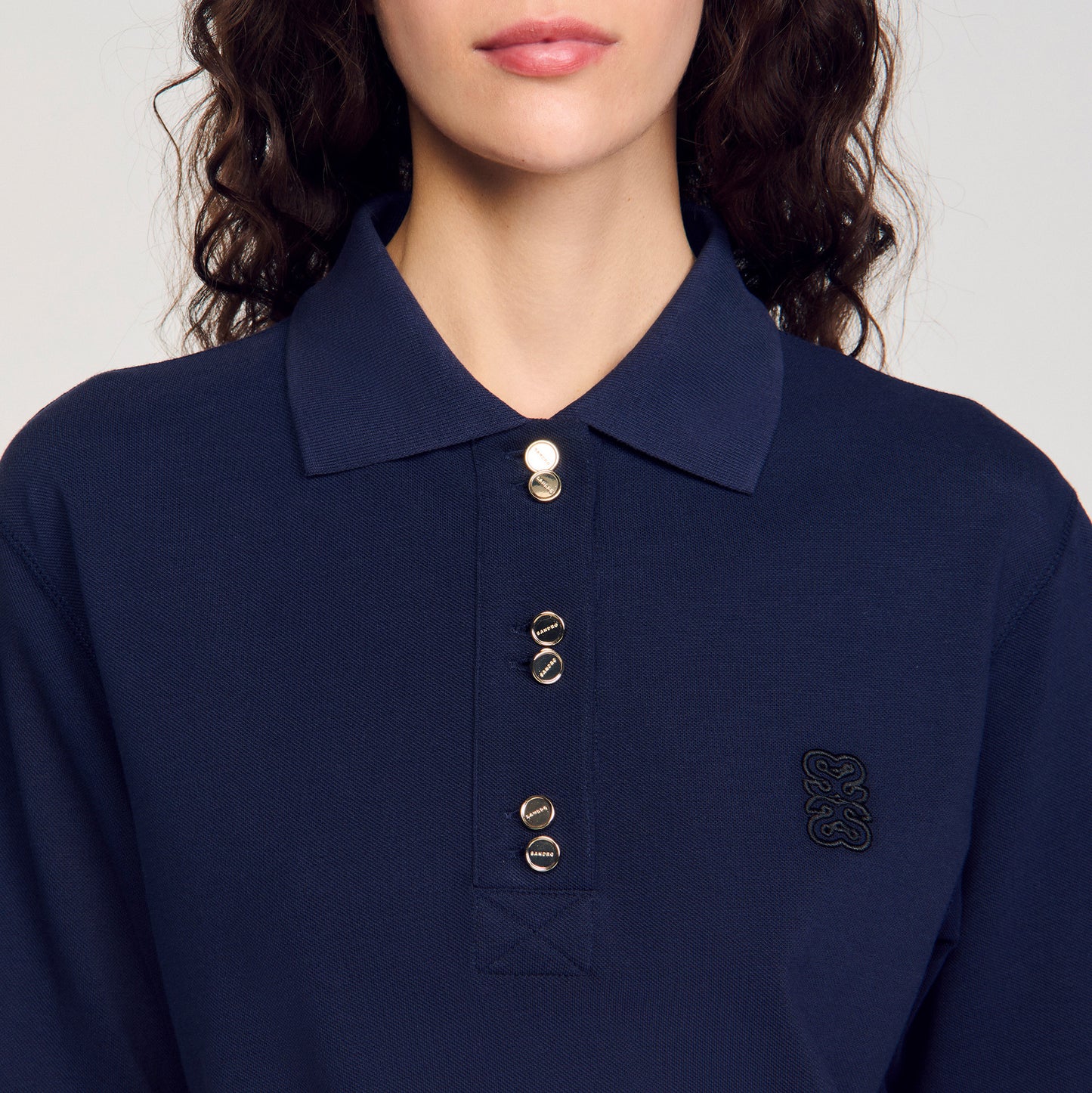 Polo con botones de fantasía