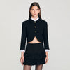 Chaqueta corta con botones de joya