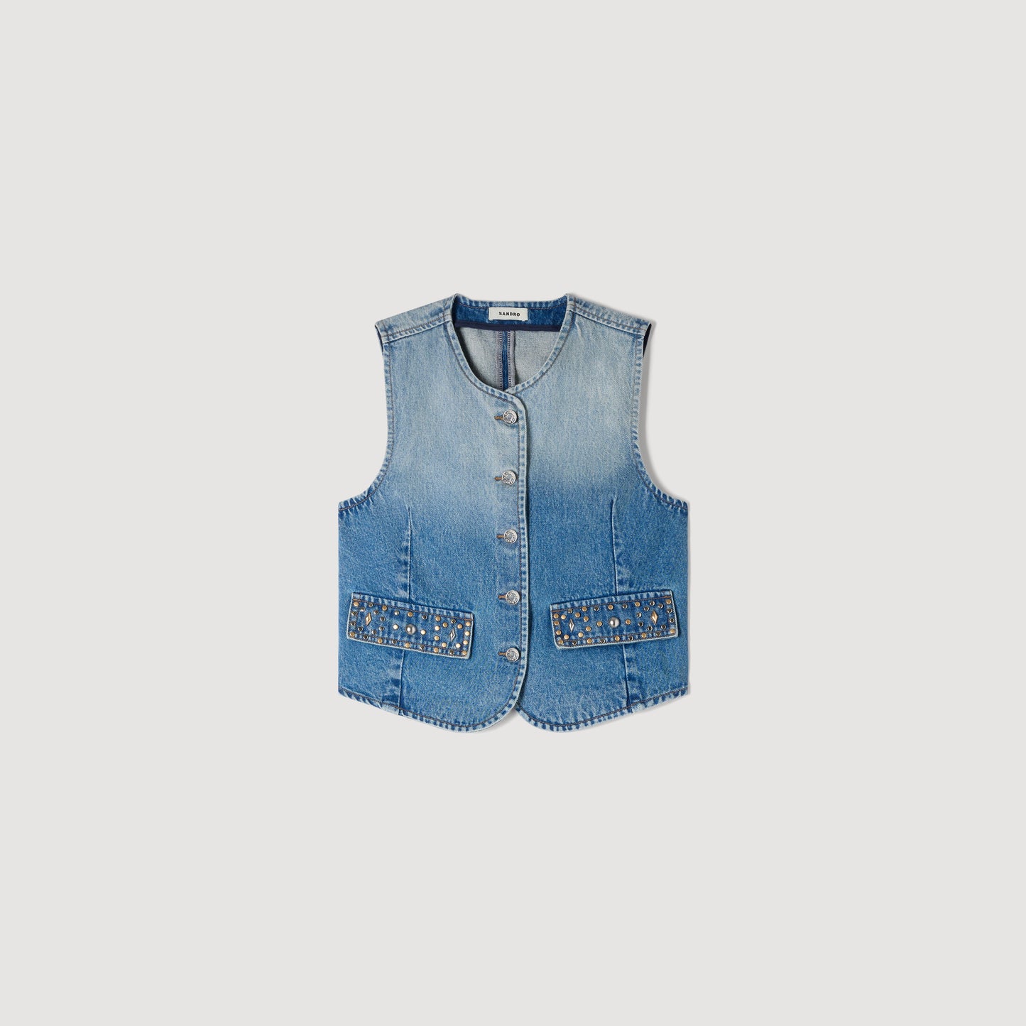 Chaleco corto denim con tachuelas