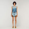Chaleco corto denim con tachuelas