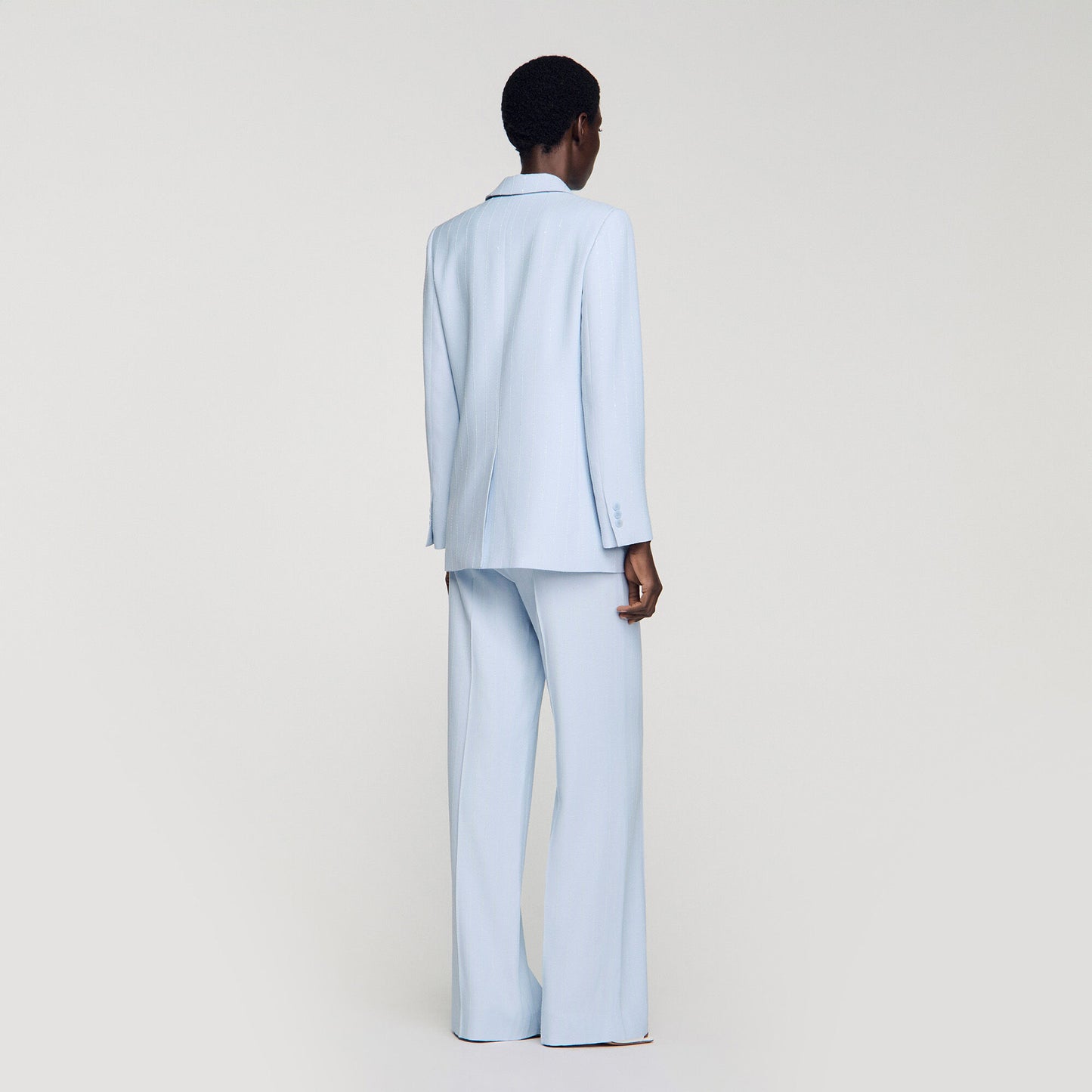 Americana con rayas de lentejuelas