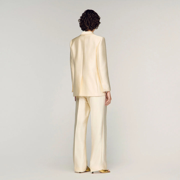 Chaqueta satinada con detalle flor