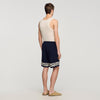 Short fluido motivo contraste
