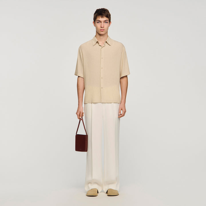 Camisa plisada con cuello italiano