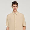 Camisa plisada con cuello italiano