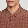 Camisa fluida con estampado de cadenas