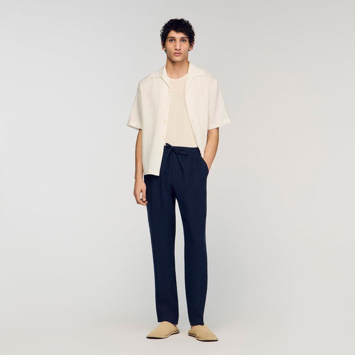 Pantalón recto de lino elástico