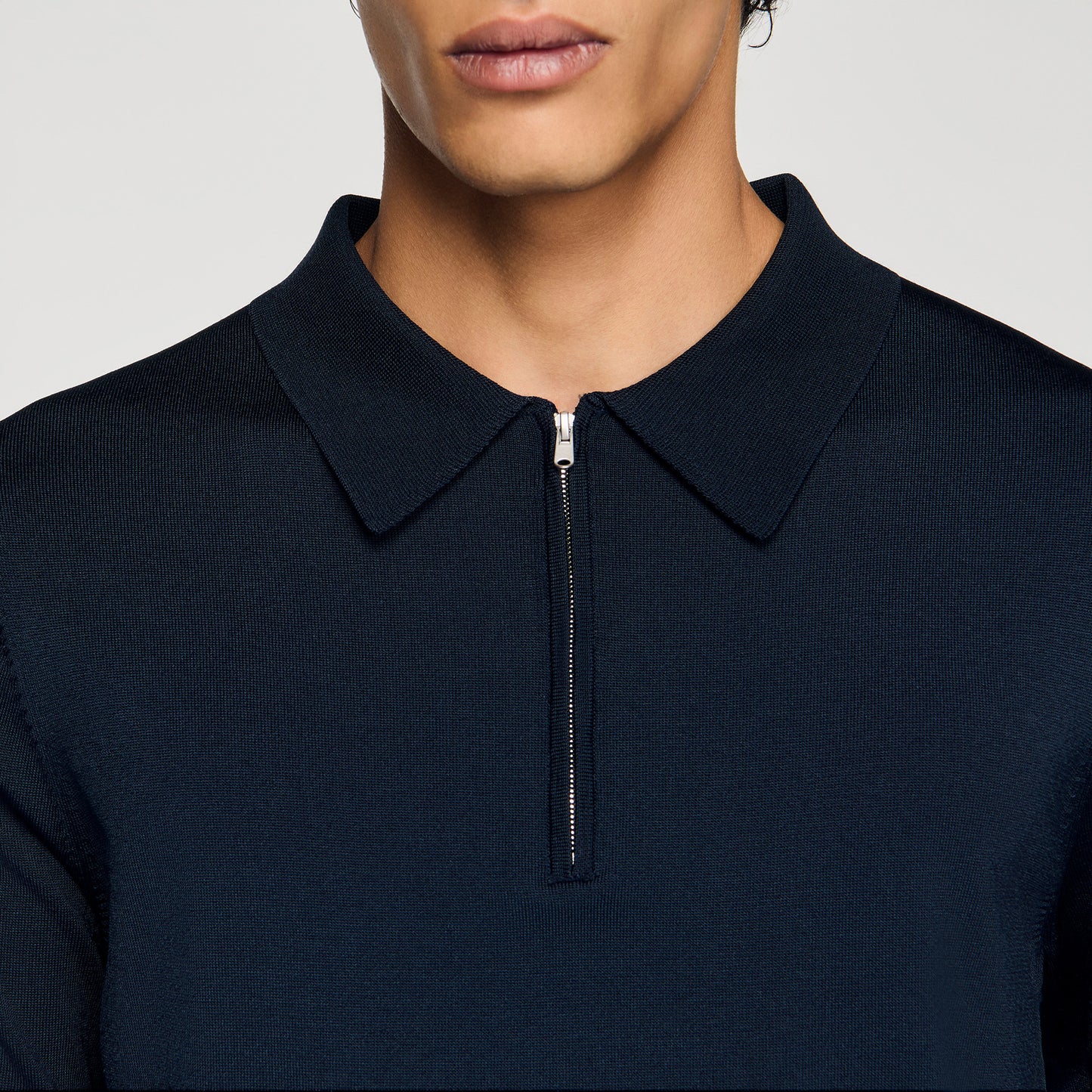Polo de punto con cuello cremallera