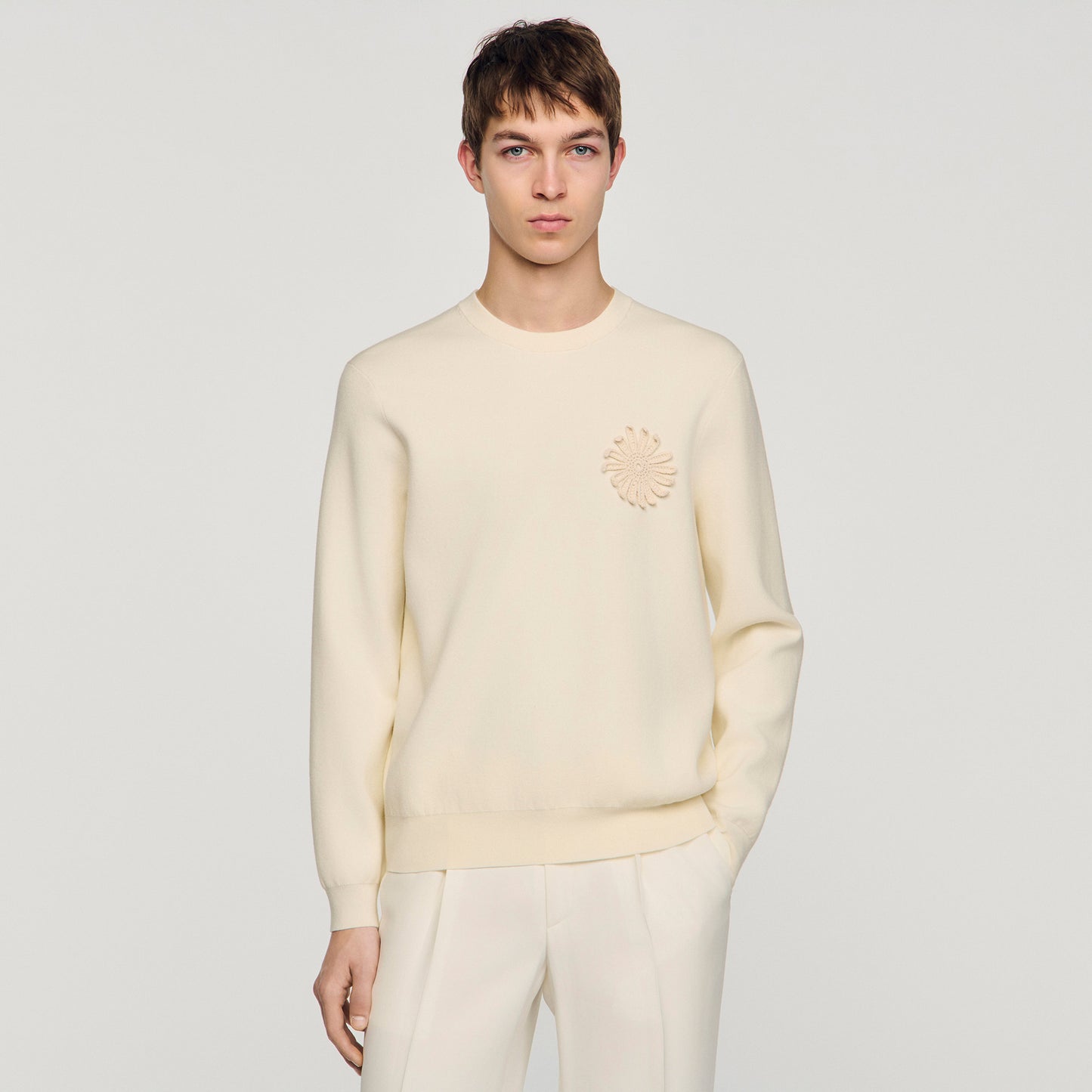 Sudadera de punto con flor crochet