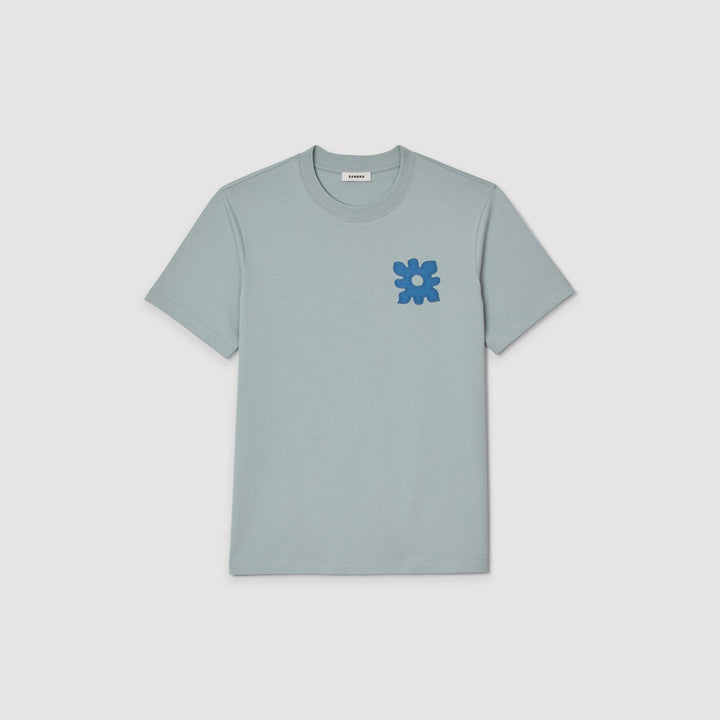 Camiseta con detalle de flor