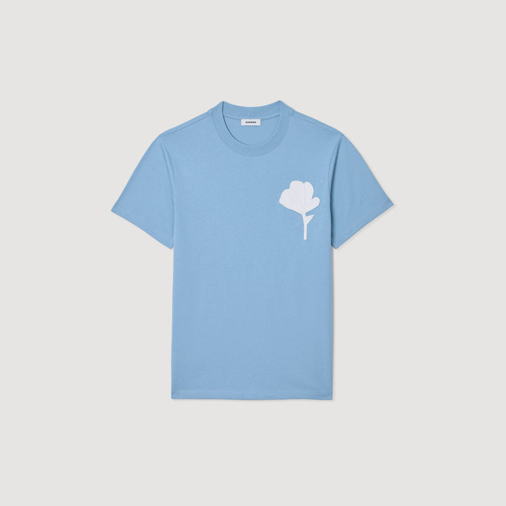 Camiseta con parche de flor