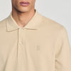 Polo de algodón con logo de cuero