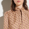 Camisa estampada con cuello de corbata Chainy