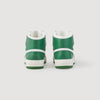 Sneakers altas de pie