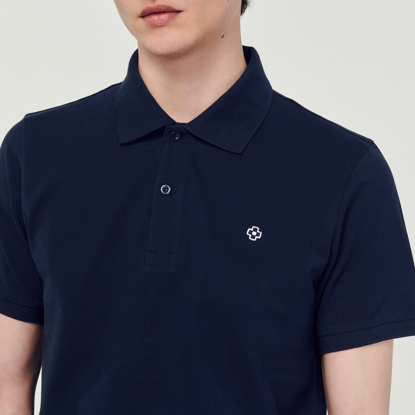 Polo con parche Square Cross